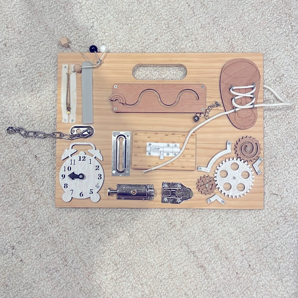 All wooden Montessori busy board